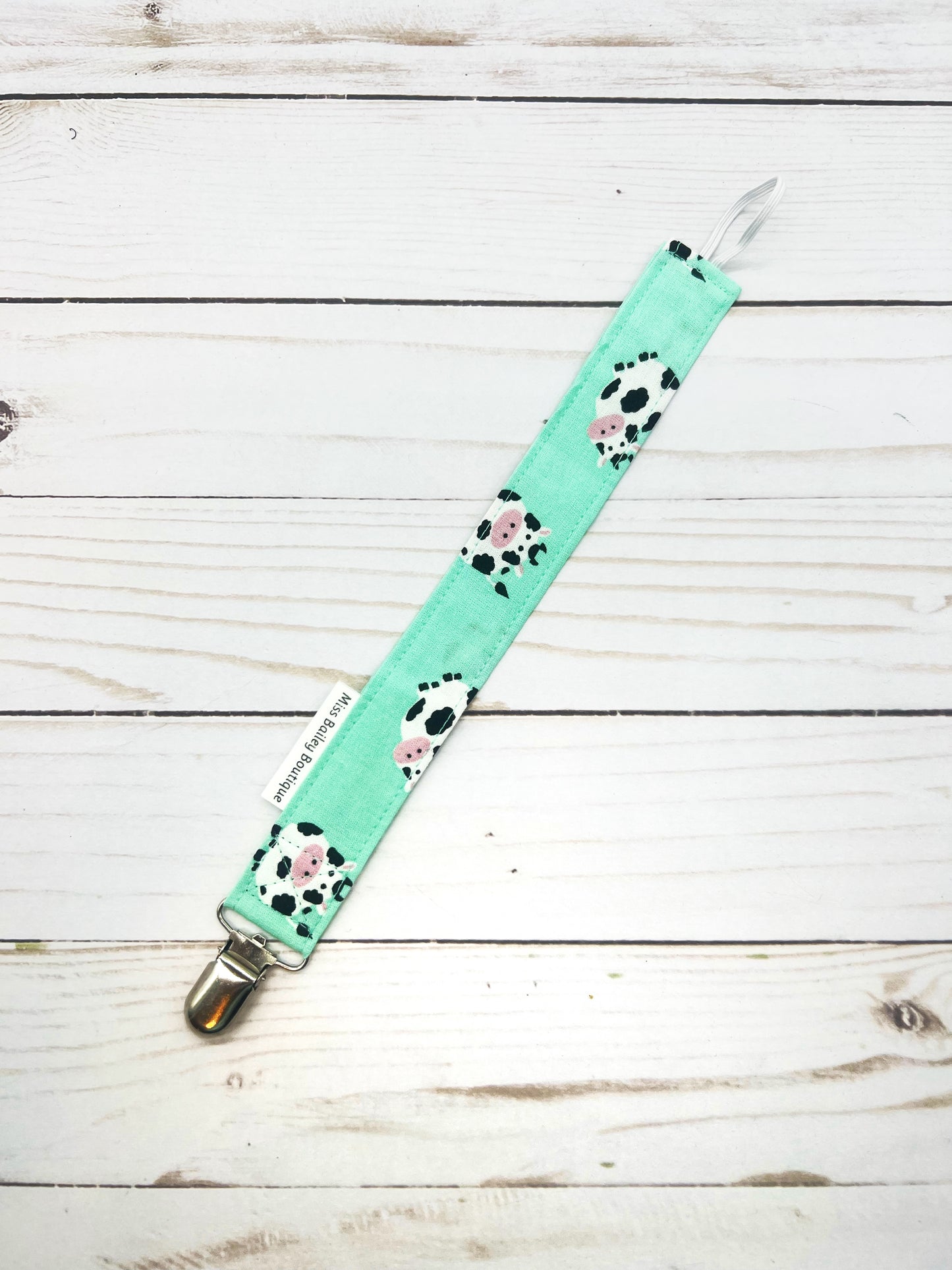 Mint Cow Pacifier Clip